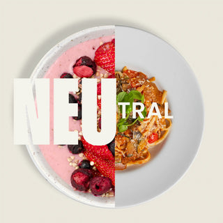 Two halves of a plate with a pink dessert on one side and a pasta dish with greens on the other with the text 'Neutral' overlayed