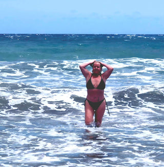 WillPowders customer Astrid after image. A woman coming out of the sea