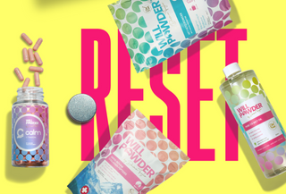 Pink text with the words RESET, with 4 WillPowders products; Calm, Bovine Collagen, MCT Oil and MCT Keto Powder on a yellow background