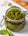 A jar or parsley and pumpkin pesto