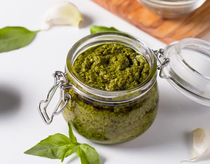 A jar or parsley and pumpkin pesto