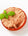 chicken liver pate in a red dish on a white background 