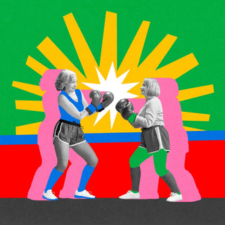 2 women boxing against a colourful background