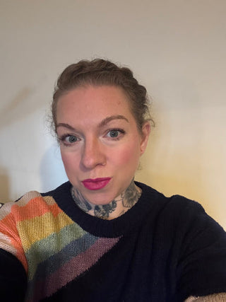 Blonde woman looking at the camera