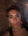 woman with short hair looking at the camera. 