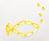 A fish shape is made using yellow translucent capsules on a white background, with smaller capsules representing bubbles coming from the fish's mouth.
