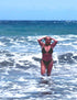 WillPowders customer Astrid after image. A woman coming out of the sea