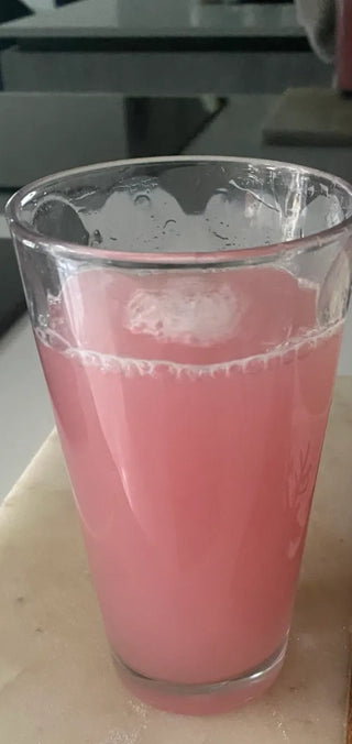 Glass of WillPowders Electrotide Watermelon