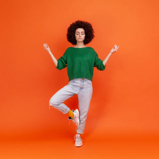 Woman stood on one leg
