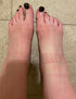 Two feet on tiled floor