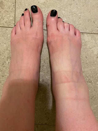 Two feet on tiled floor