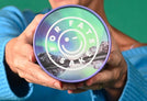 Woman holding a Protein Powder tub showing the lid with the text For Fats Sake, white text on a mountain range background