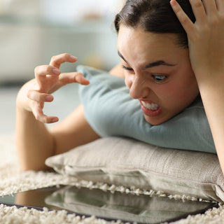A person who's face shows an expression of rage