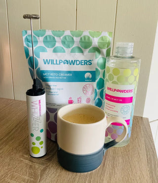 Collection of WillPowders products, Whizzer, Keto Creamer & MCT Oil. Will a mug containing all of them